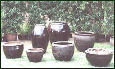 Earthen black glazed pots